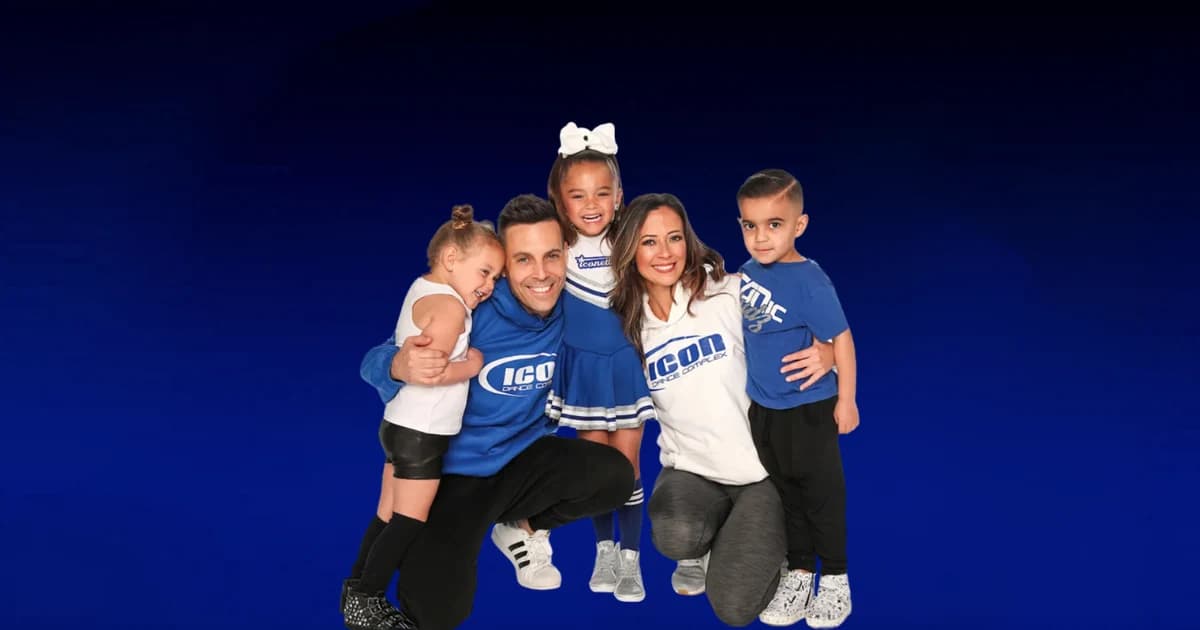 Icon studio family portrait with young dancers in blue apparel.