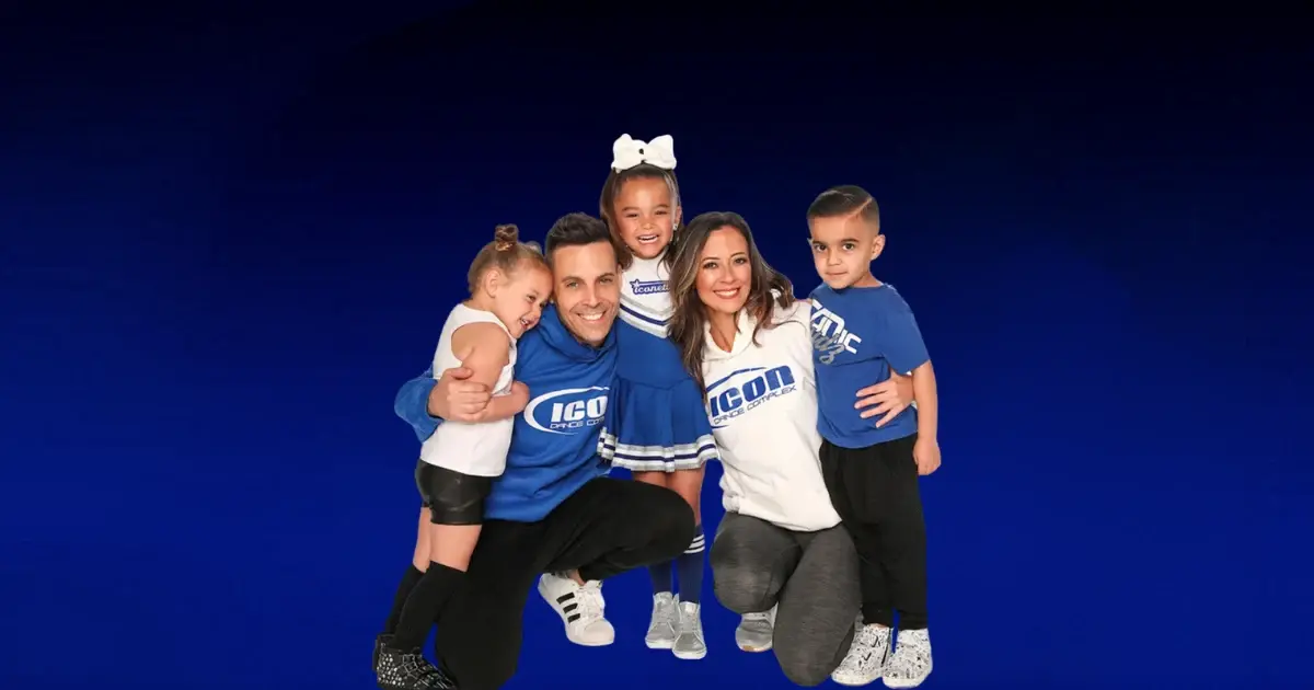 Icon studio family portrait with young dancers in blue apparel.